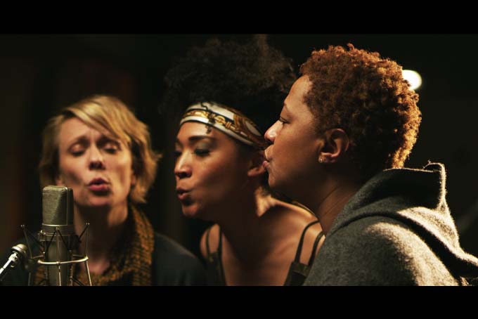 This undated publicity photo released by the Sundance Institute shows, from left, Jo Lawry, Judith Hill and Lisa Fischer in a scene from the film, "20 Feet From Stardom," included in the US Documentary Competition at the 2013 Sundance Film Festival. The film is also nominated for an Oscar for best documentary feature. The 86th Academy Awards are presented on Sunday, March 2, 2014. (AP Photo/Sundance Institute, Graham Willoughby, file)