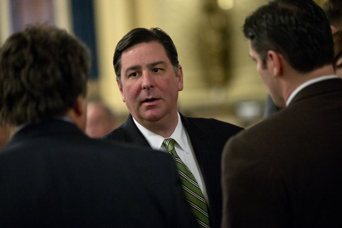Pittsburgh Mayor Bill Peduto is seen before Gov. Tom Corbett delivers his budget address for the 2014-15 fiscal year to a joint session of the Pennsylvania House and Senate on Tuesday, Feb. 4, 2014, in Harrisburg, Pa. (AP Photo/Matt Rourke)