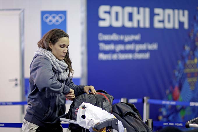 United States bobsled brakeman Lolo Jones arrives at the 2014 Winter Olympics,  Jan. 30, 2014, in Sochi, Russia. (AP Photo/David Goldman, Pool)