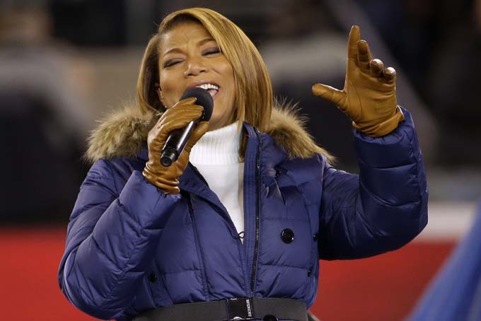  Queen Latifah sings "America the Beautiful" before the NFL Super Bowl XLVIII football game between the Seattle Seahawks and the Denver Broncos Sunday, Feb. 2, 2014, in East Rutherford, N.J. (AP Photo/Matt Slocum)
