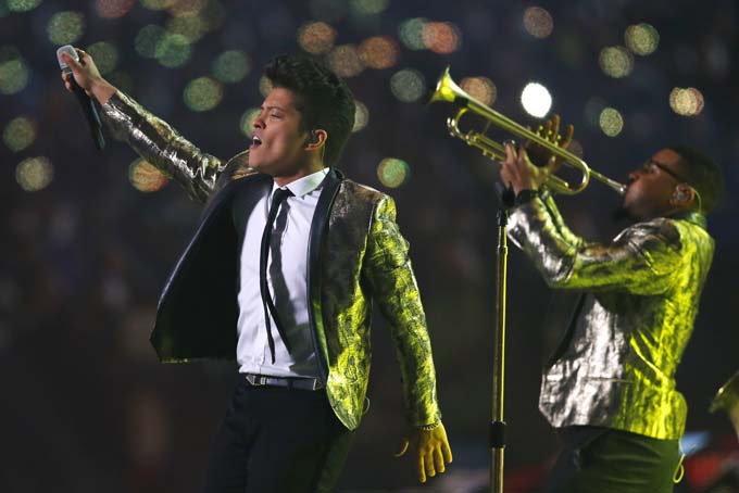 Bruno Mars performs during the halftime show of the NFL Super Bowl XLVIII football game Sunday, Feb. 2, 2014, in East Rutherford, N.J. (AP Photo/Paul Sancya)