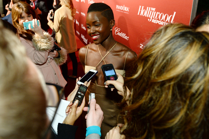 Lupita Nyong'o arrives at The Hollywood Reporter Nominees Night presented by Cadillac, Bing, Delta, Pandora jewelry, Qua, and Zenith, at Spago on Monday, Feb. 10, 2014, in Beverly Hills, Calif. (Photo by Jordan Strauss/Invision for The Hollywood Reporter/AP Images)