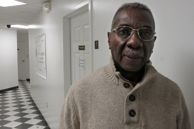 In this Monday, Jan. 27, 2014 photo, Gerald Terrell, the senior trustee for the Mount Zion First African Baptist Church, stands in the church's offices in Charlottesville, Va. He says the church sits just across the street from a public housing project where children of families often don’t have the advantages that wealthier families consider basic. At least when he was a boy, growing up in segregated central Florida, those with limited education knew they could find a job in agriculture or a factory. Today, "it’s harder because we’ve moved from an industrial society to a technological society. And who has the computer at home? The haves," says Terrell, who volunteers as a mentor to African-American boys. (AP Photo/Adam Geller)