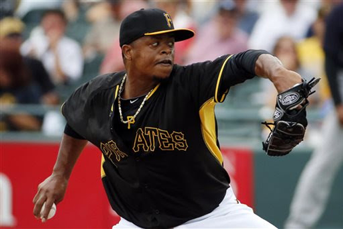 Pittsburgh Pirates pitcher Edinson Volquez throws in the second inning of an exhibition spring training baseball game against the New York Yankees in Bradenton, Fla., Wednesday, Feb. 26, 2014. The Pirates won 6-5. (AP Photo/Gene J. Puskar)