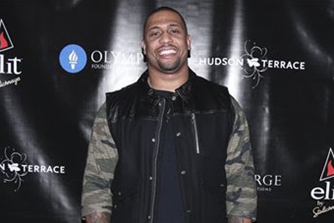 LaMarr Woodley, linebacker for the Pittsburgh Steelers, arrives at the Athletes Quarterly Super Bowl Party at Hudson Terrace, Wednesday, Jan. 29, 2014, in New York. (John Minchillo/AP Images for Athletes Quarterly)