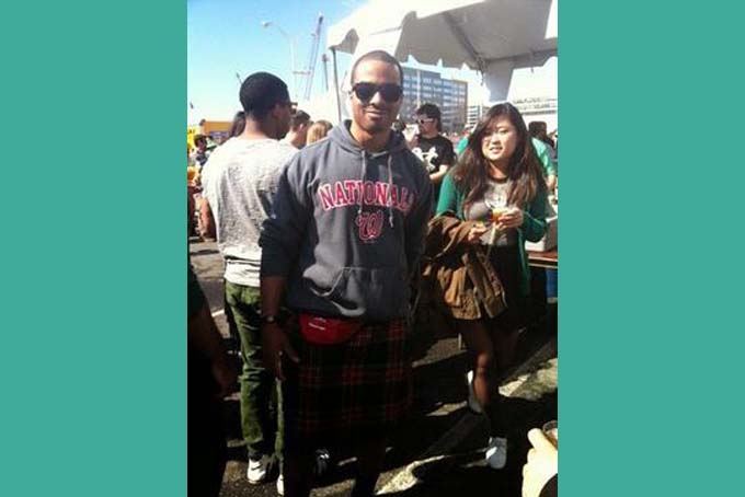 Ed Carter a civilian worker at the Navy Yard shows off his kilt at Drink the District Shamrock Beer Bash March 15