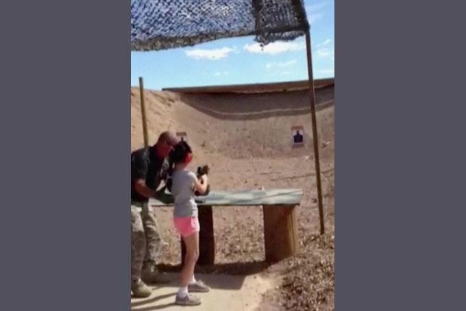 Girl With Uzi