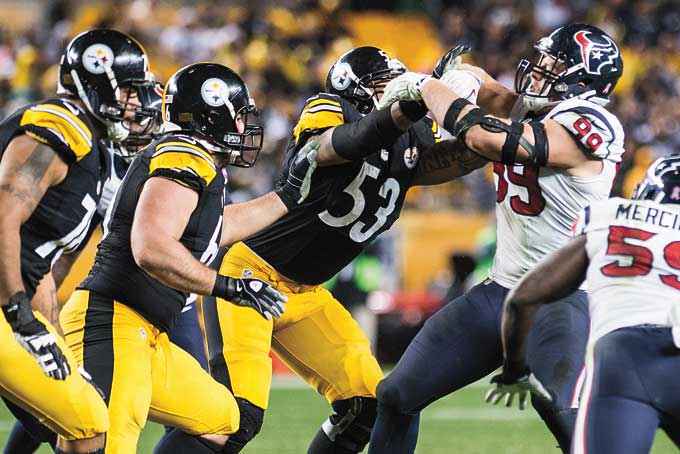 JJ-Watt-stopped-by-Pouncey.-Texans-at-Steelers-14102043