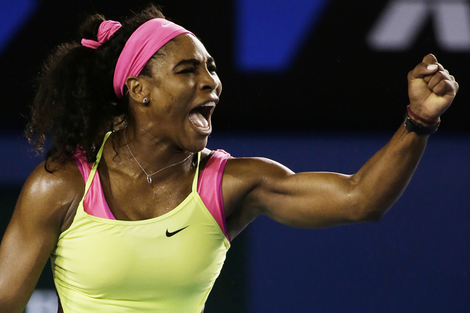 Serena Williams of the U.S. celebrates after winning a point against Maria Sharapova of Russia during the women's singles final at the Australian Open tennis championship in Melbourne, Australia, Saturday, Jan. 31, 2015. (AP Photo/Vincent Thian)