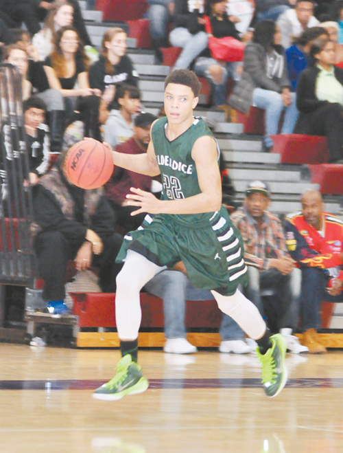 LEADING THE WAY—Allderdice’s James Jackson scored 21 points to lead the Dragons to a 66-53 win over Obama Academy to remain unbeaten in City League action.  