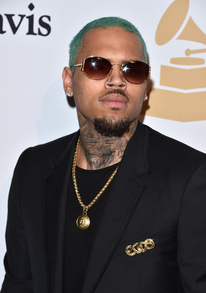 Chris Brown arrives at the 2015 Clive Davis Pre-Grammy Gala at the Beverly Hilton Hotel on Saturday, Feb. 7, 2015, in Beverly Hills, Calif. (Photo by John Shearer/Invision/AP