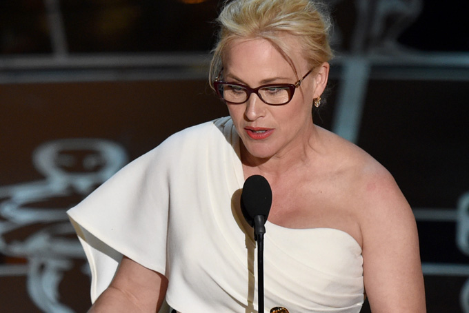Patricia Arquette accepts the award for best actress in a supporting role for “Boyhood” at the Oscars on Sunday, Feb. 22, 2015, at the Dolby Theatre in Los Angeles. (Photo by John Shearer/Invision/AP)