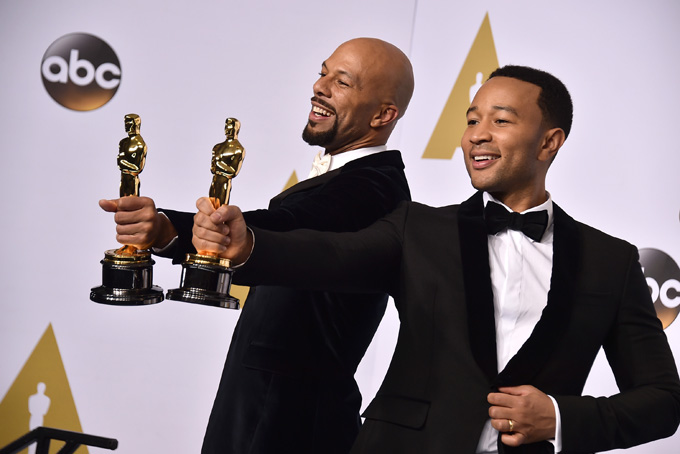Common, left, and John Legend pose in the press room with the award for best original song in a feature film for “Glory” from “Selma” at the Oscars on Sunday, Feb. 22, 2015, at the Dolby Theatre in Los Angeles. (Photo by Jordan Strauss/Invision/AP)