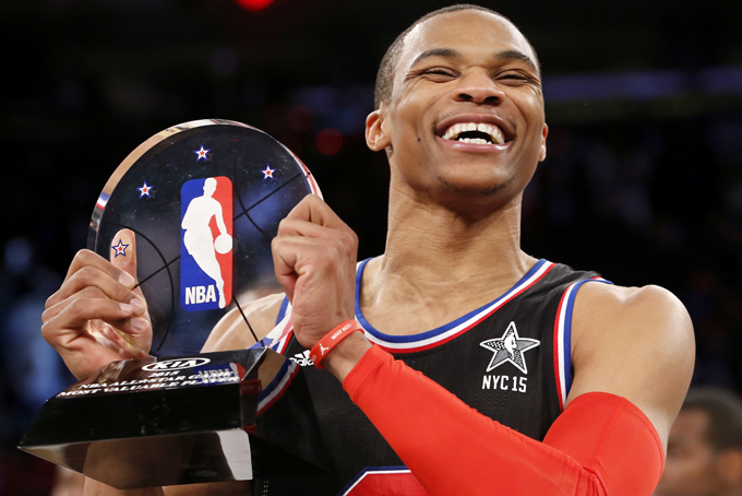 West Team’s Russell Westbrook, of the Oklahoma City Thunder, holds the MVP trophy after the NBA All-Star basketball game, Sunday, Feb. 15, 2015, in New York. The West Team won 163-158. (AP Photo/Kathy Willens)