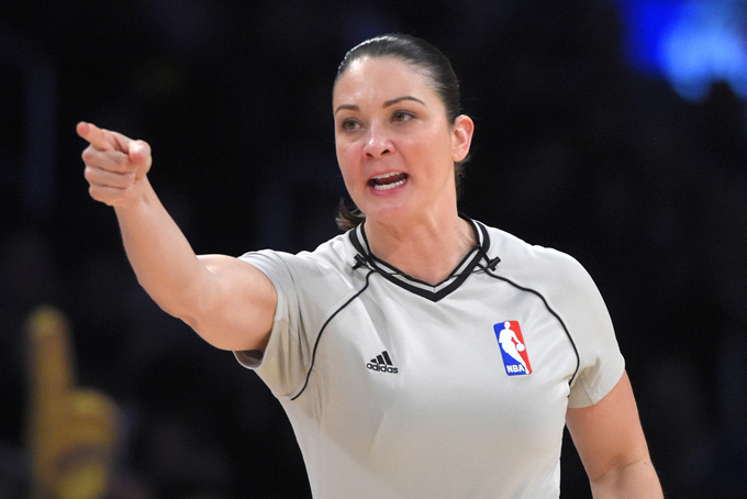 In this Jan. 9. 2015, file photo, referee Lauren Holtkamp makes a call during an NBA basketball game between the Los Angeles Lakers and the Orlando Magic in Los Angeles. Clippers guard Chris Paul was critical of Holtkamp following the Clippers' 105-94 loss to the Cavaliers on Thursday night, Feb. 5, 2015 Paul was assessed a technical foul in the third quarter by Holtkamp, who worked with officials Ken Mauer and Eric Lewis. Los Angeles was given five technicals--four in the third quarter, three of them in a 52-second span. (AP Photo/Mark J. Terrill, File)