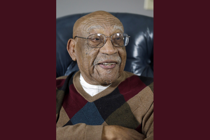 In this Nov. 13, 2014,  file photo former PGA golfer Charlie Sifford talks during an interview at his home in Brecksville, Ohio. Sifford, who fought the Caucasian-only clause on the PGA Tour and became its first black member died Tuesday night Feb. 3, 2015. He was 92. The PGA of America confirmed the death of Sifford, who recently suffered a stroke. No cause of death was given. (AP Photo/Mark Duncan)