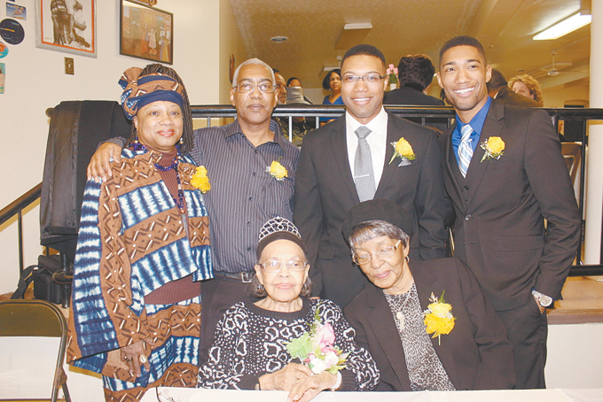 FAMILY SUPPORT—Standing, from left: Tawnya Farris-Redwood, Carl Redwood Jr., Maurice Redwood and Carter Redwood. Seated is the birthday girl Dolores Redwood and Elber Farris. (Photos by J.L. Martello)  