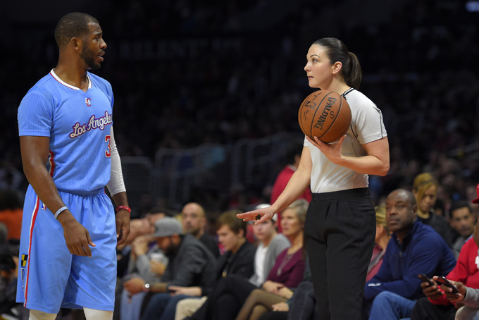 Los Angeles Clippers guard Chris Paul, left, talks with referee Lauren Holtkamp during the first half of an NBA basketball game against the Miami Heat, Sunday, Jan. 11, 2015, in Los Angeles. (AP Photo/Mark J. Terrill)