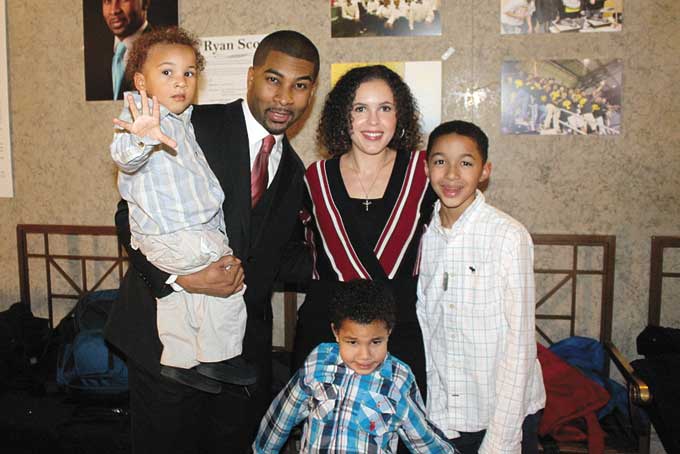 RYAN SCOTT AND FAMILY—From left: Ryan Scott is holding Jianni, standing in blue is Jordan and Jeremiah on far right and wife Cassie. (Photos by J.L. Martello) 