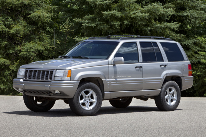 This undated photo provided by Fiat Chrysler Automobiles shows the 1998 Jeep Grand Cherokee. Only 12 percent of 1.56 million 2002-2007 Jeep Liberty and 1993-1998 Jeep Grand Cherokee SUVs have been repaired in the 18 months since they were recalled, a much slower pace than usual. The U.S. government in June 2013 asked Chrysler to recall the SUVs because the position of the fuel tank leaves them susceptible to rupture in a rear-end crash. (AP Photo/Chrysler)