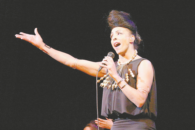 MARIE DAULNE founder of Zap Mama performing on stage. (Photos by J.L. Martello) 