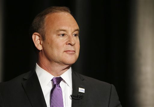 In this May 8, 2014 file photo, Pennsylvania state treasurer Rob McCord waits for the start of a Pennsylvania Democratic Gubernatorial Primary Debate in Philadelphia. McCord said in a video released by his lawyer Friday, Jan. 30, 2015, that he is resigning immediately and plans to plead guilty to federal charging that involve him telling two potential campaign contributors during the 2014 gubernatorial primary that he could make it difficult for them to continue to do business with the state. (AP Photo/Matt Slocum, File)