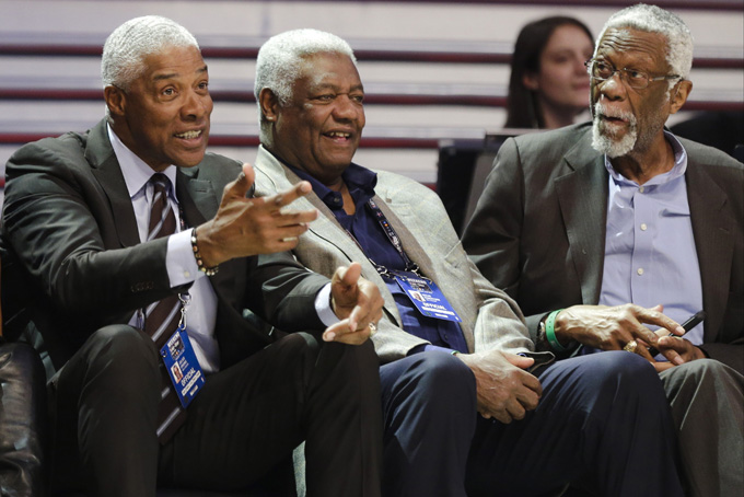 Julius Erving, Oscar Robinson and Bill Russell, from left, talk during the NBA All-Star Saturday Slam Dunk event Saturday, Feb. 14, 2015, in New York. (AP Photo/Frank Franklin II)