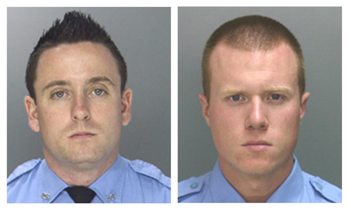 In this undated photo combination provided by the Philadelphia District Attorney's Office, Officers Sean McKnight, left, and Kevin Robinson are shown. The two officers face brutality charges after prosecutors say they knocked a man off a scooter and beat him so severely another officer thought the bloodied man had been shot. They were charged Thursday, Feb. 5, 2015 with assault, criminal conspiracy and reckless endangerment. They're also charged with lying about the May 2013 incident. (AP Photo/Philadelphia District Attorney's Office)