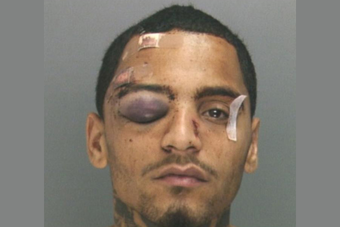 In this undated photo provided by the Philadelphia District Attorney's Office, Najee Rivera is shown. Philadelphia Police Office Sean McKnight and Kevin Robinson face brutality charges after prosecutors say they knocked a Rivera off a scooter and beat him so severely another officer thought the bloodied man had been shot. McKnight and Robinson were charged Thursday, Feb. 5, 2015 with assault, criminal conspiracy and reckless endangerment. They're also charged with lying about the May 2013 incident. (AP Photo/Philadelphia District Attorney's Office)