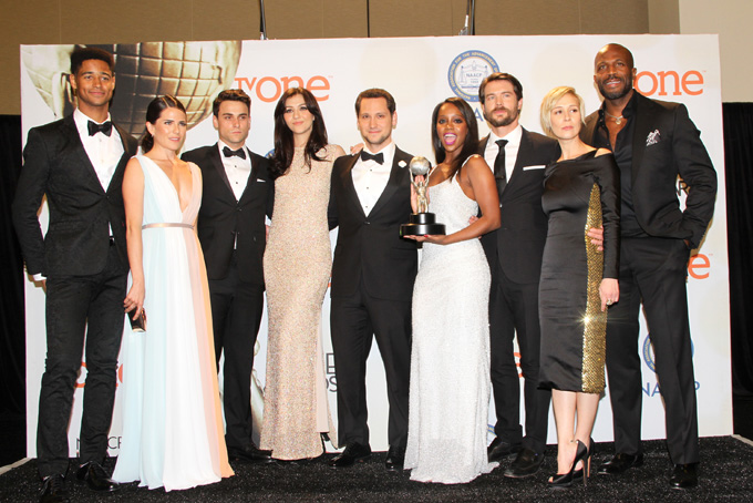 Alfred Enoch, from left, Karla Souza, Jack Falahee, Katie Findlay, Matt McGorry, Aja Naomi King, Charlie Weber, Liza Weil, and Billy Brown poses in the press room with the award for outstanding drama series for “How to Get Away with Murder” at the 46th NAACP Image Awards at the Pasadena Civic Auditorium on Friday, Feb. 6, 2015, in Pasadena, Calif. (Photo by Arnold Turner/Invision/AP)