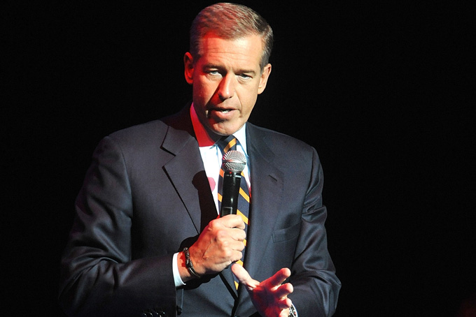 In this Nov. 5, 2014 file photo, Brian Williams speaks at the 8th Annual Stand Up For Heroes, presented by New York Comedy Festival and The Bob Woodruff Foundation in New York. Williams says he's temporarily stepping away from his nightly newscast amid questions about his credibility. In a message sent to NBC News staff and released by NBC on Saturday, Feb. 7, 2015, Williams says it has "become painfully apparent" to him that his actions have made him too much a part of the news. (Photo by Brad Barket/Invision/AP, File)