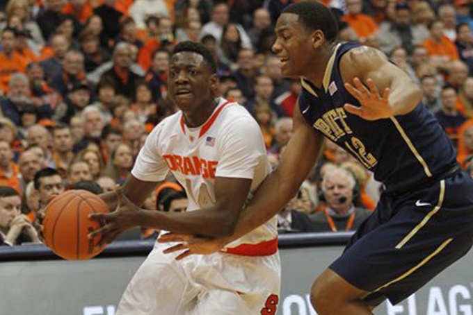 Syracuse’s Kaleb Joseph, left, drives to the basket against Pittsburgh’s Chris Jones, right, in the second half of an NCAA college basketball game in Syracuse, N.Y., Saturday, Feb. 21, 2015. Pittsburgh won 65-61. (AP Photo/Nick Lisi)