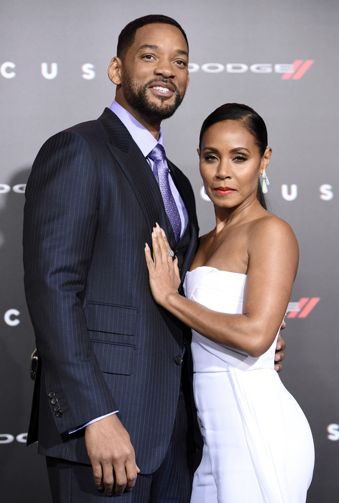 Will Smith, left, and Jada Pinkett Smith arrive at the world premiere of "Focus" at the TCL Chinese Theatre on Tuesday, Feb. 24, 2015, in Los Angeles. (Photo by Chris Pizzello/Invision/AP)