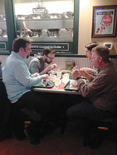LOTS TO CHOOSE FROM—Customers enjoying their selection from Wing Stop menu.