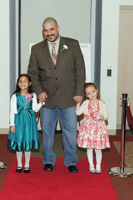 MONDAIRO JONES WITH DAUGHTERS VIRGINIA AND ELLA 