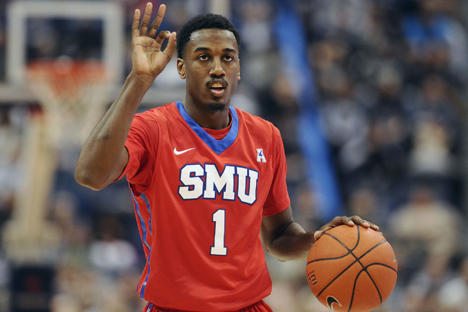  In this March 1, 2015, file photo, SMU’s Ryan Manuel gestures during the second half of an NCAA college basketball game against Connecticut, in Hartford, Conn. Ryan and Simone Manuel were always close. They still talk just about every day, even though they attend college in different parts of the country. (AP Photo/Jessica Hill, File)