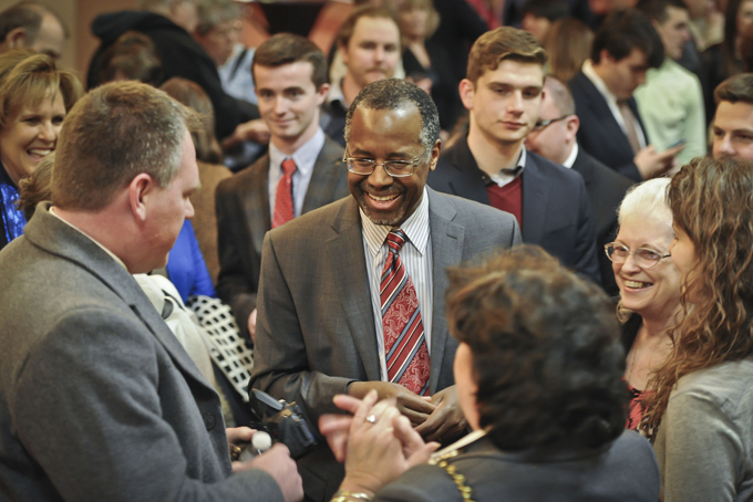 Dr. Ben Carson, center, shakes hands with guests Thursday, Feb. 12, 2015, before The Boyle County Republican Party's  “An Evening with Dr. Ben Carson” at the Norton Center for the Arts on the campus of Centre College in Danville, Ky. Dr. Ben Carson is a world-renowned pediatric neurosurgeon, a highly-regarded motivational speaker, philanthropist, best-selling author, and a potential Presidential Candidate in 2016. (AP Photo/The Advocate Messenger, Clay Jackson)