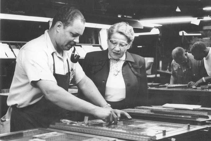 PRINTING PRESS—Jesse Vann with a Typesetter at the Courier office in the Hill District on Centre Avenue. The Courier had its own printing press.