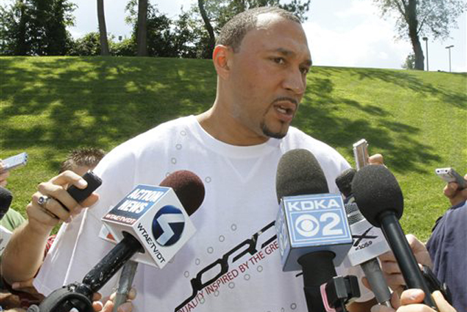 ADVANCE FOR WEEKEND EDITIONS, FEB. 27-MARCH 1 - FILE - In this July 30, 2010, file photo, Pittsburgh Steelers quarterback and player representative Charlie Batch talks with reporters as he arrives at the NFL football team's training camp in Latrobe, Pa. Approaching the end of his dozen seasons as an NFL quarterback, Charlie Batch felt comfortable about moving on to another career. He's a rarity. (AP Photo/Keith Srakocic, File)