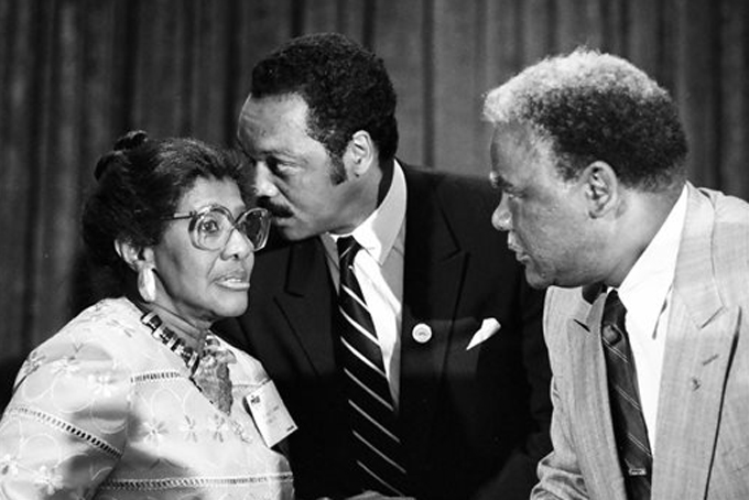 In this Aug. 3, 1986 photo, the Rev. Willie T. Barrow, left, confers with Jesse Jackson Jr., center, and Chicago Mayor Harold Washington during the Operation Push convention in Chicago. Barrow, a longtime civil right activist, died Thursday, March 12, 2015, at a hospital where she was being treated for a blood clot in her lung. She was 90. (AP Photo/Sun-Times Media) 