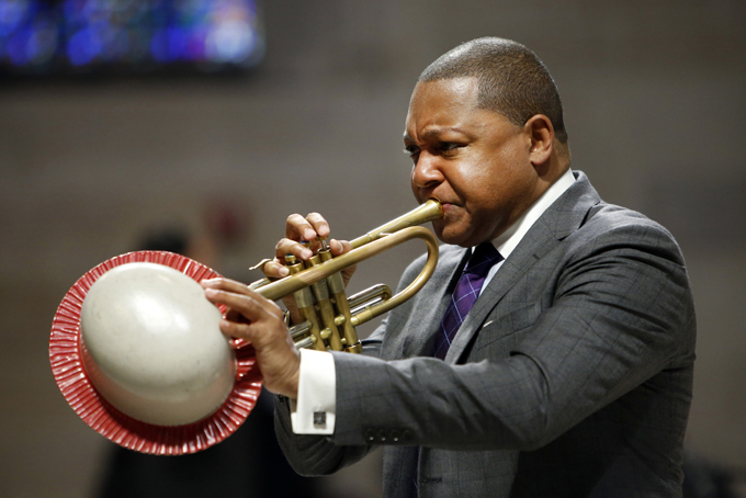 In this Sept. 20, 2014, file photo, musician Wynton Marsalis performs during a memorial service for actress Ruby Dee at The Riverside Church in New York. It was announced Wednesday, March 11, 2015, that Marsalis is scratching a concert in Venezuela amid rising tensions between Venezuela and the U.S. that are making it harder for U.S. citizens to travel to the South American country. (AP Photo/Jason DeCrow, File)