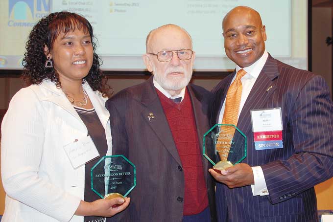 WHAT AN HONOR—Amalia Ritter the niece and Eugene the husband of Faye Obregon Ritter accept the 2015 MWDBE Governmental Committee Hall of Fame Award along with inductee Keith B. Key of Keith B. Key Enterprises. (Photos by Diane I. Daniels)