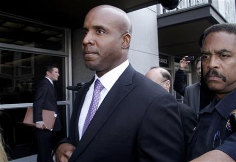 In this April 13, 2011, file photo, former baseball player Barry Bonds leaves federal court in San Francisco, after being found guilty of one count of obstruction of justice. (AP Photo/George Nikitin, File)