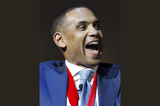 In this Nov. 23, 2014, file photo, Duke great Grant Hill talks about his career during a National Collegiate Basketball Hall of Fame induction event in Kansas City, Mo. (AP Photo/Colin E. Braley, File)