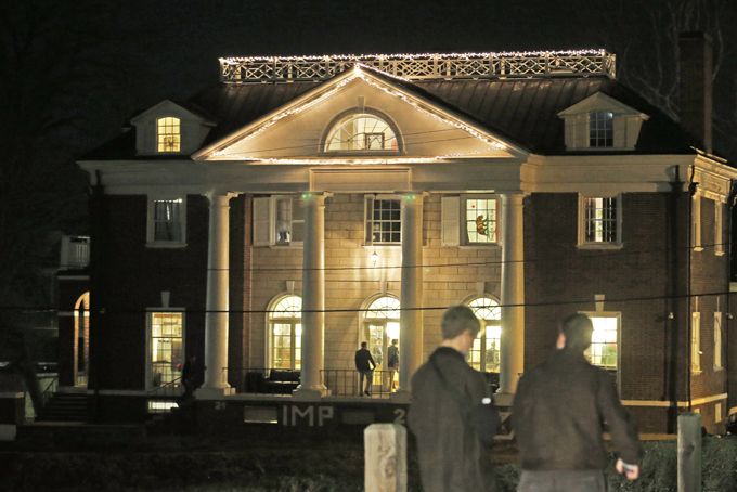 Students participating in rush pass by the Phi Kappa Psi house at the University of Virginia in Charlottesville, Va., in this Jan. 15, 2015 file photo. (AP Photo/Steve Helber, File)