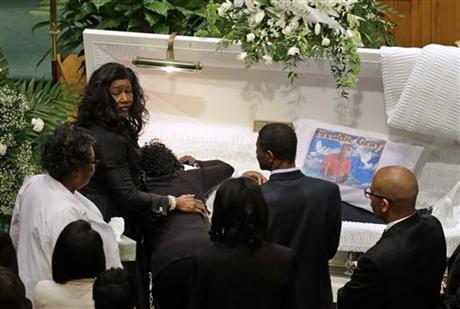ANOTHER GRIEVING MOM--Gloria Darden, mother of Freddie Gray, is comforted as she embraces his body before his funeral, April 27, at New Shiloh Baptist Church in Baltimore. (AP Photo/Patrick Semansky) 