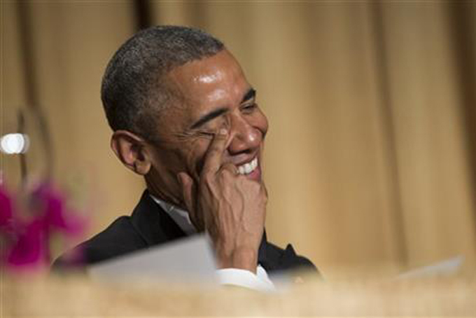 President Barack Obama laughs at a joke during the White House Correspondents' Association dinner at the Washington Hilton on Saturday, April 25, 2015, in Washington. (AP Photo/Evan Vucci)