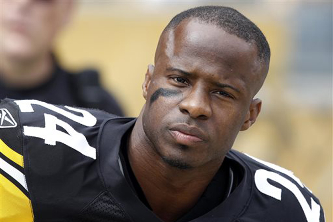 In this Sept. 18, 2011, file photo, Pittsburgh Steelers cornerback Ike Taylor sits on the bench during the first half of the NFL football game against the Seattle Seahawks in Pittsburgh. Taylor announced his retirement Tuesday, April 14, 2015, ending a 12-year career in which he helped lead the Steelers to two Super Bowl victories.  (AP Photo/Gene J. Puskar, File)