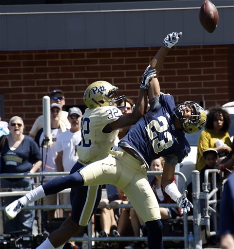Pittsburgh Blue Team wide receiver Tyler Boyd (23) can't make a catch in the end zone as Gold Team defensive back Phillipie Motley (32) defends in the third quarter of their spring NCAA college football game, Saturday, April 18, 2015, in Pittsburgh. (AP Photo/Keith Srakocic)