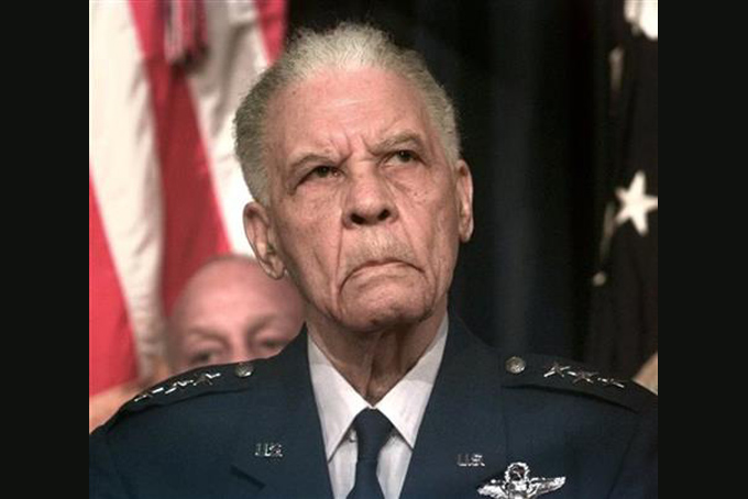 In this Dec. 9, 1998 file photo, Ret. Lt. Gen. Benjamin O. Davis Jr., listens to remarks prior to receiving his fourth star from President Clinton at the Old Executive Office Building in Washington. Davis Jr. entered West Point in 1932 as its only black cadet and spent the next four years shunned. He roomed alone and ate alone. The future Tuskegee Airman and trailblazing Air Force general later recalled he was “an invisible man.” Now more than a decade after his death, the academy that ostracized Davis is honoring him. (AP Photo/Greg Gibson, File)